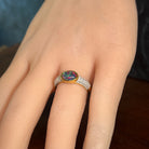Australian opal triplet ring in yellow gold-plated silver worn, oval stone, size US 7