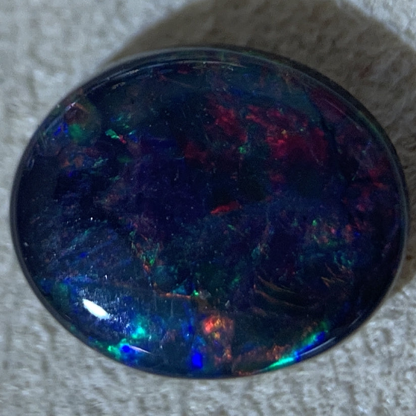 Oval Black Opal 1.24ct - Masterpiece Jewellery Opal & Gems Sydney Australia | Online Shop