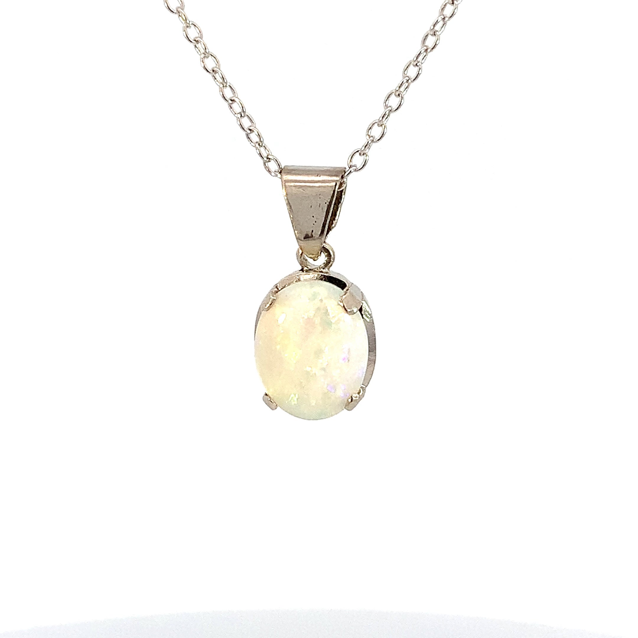 9kt White Gold claw set 9x7mm Crystal Opal pendant - Masterpiece Jewellery Opal & Gems Sydney Australia | Online Shop