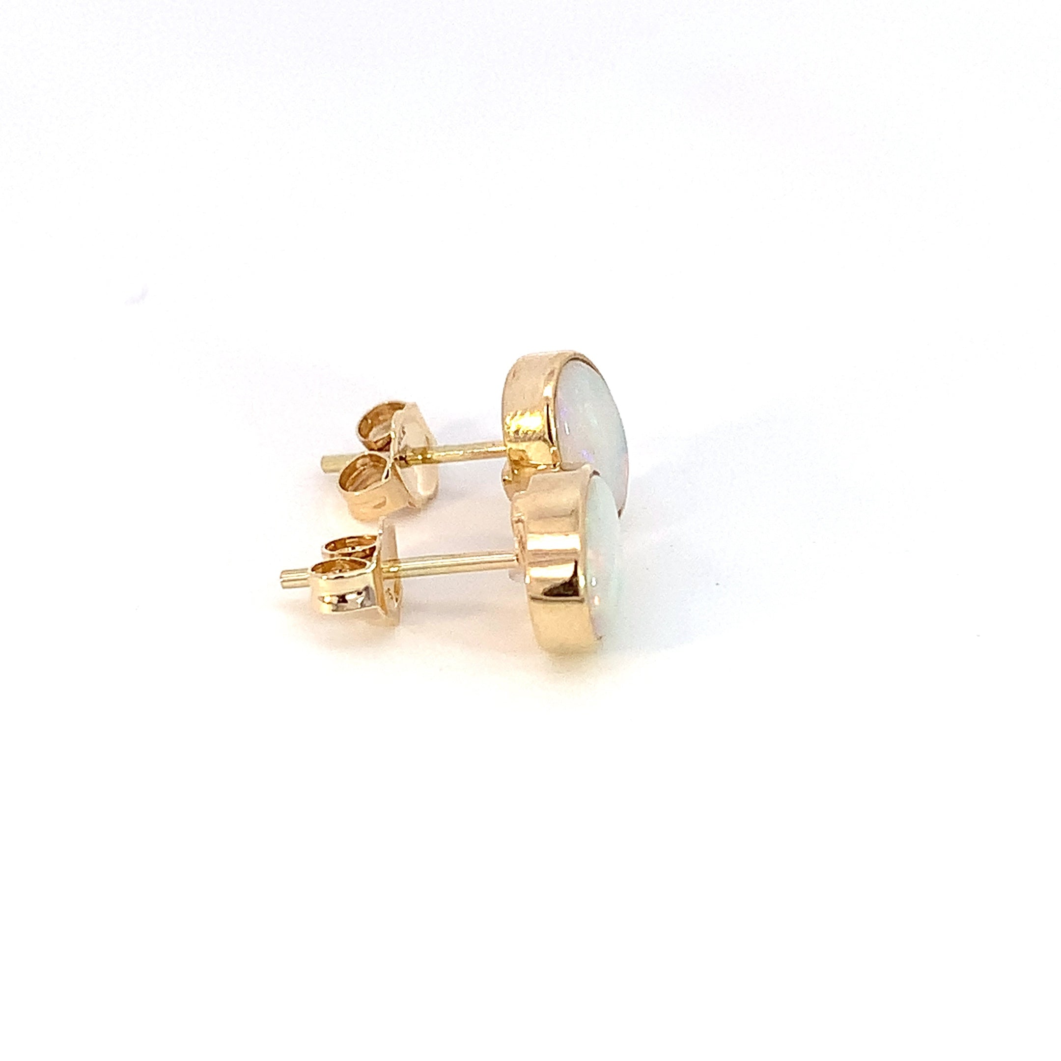 One pair of 9kt Yellow Gold Light Opal earring studs 7x5mm bezel set - Masterpiece Jewellery Opal & Gems Sydney Australia | Online Shop