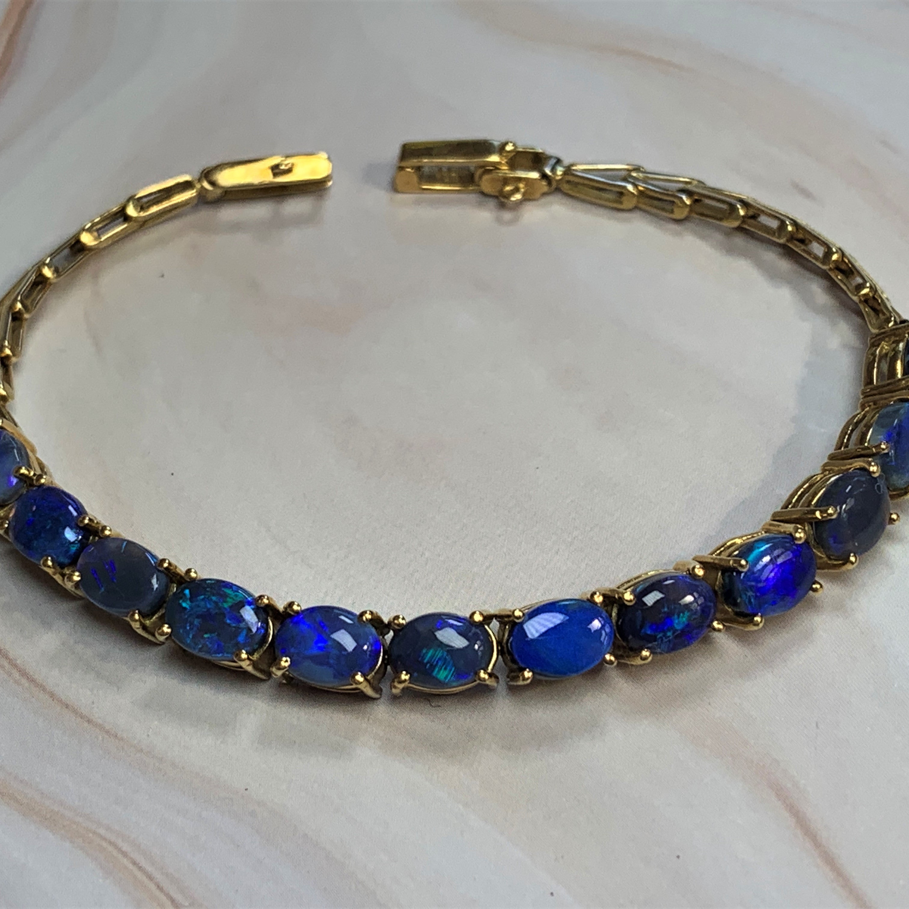 18kt Yellow Gold Black Opal 4.2ct bracelet - Masterpiece Jewellery Opal & Gems Sydney Australia | Online Shop