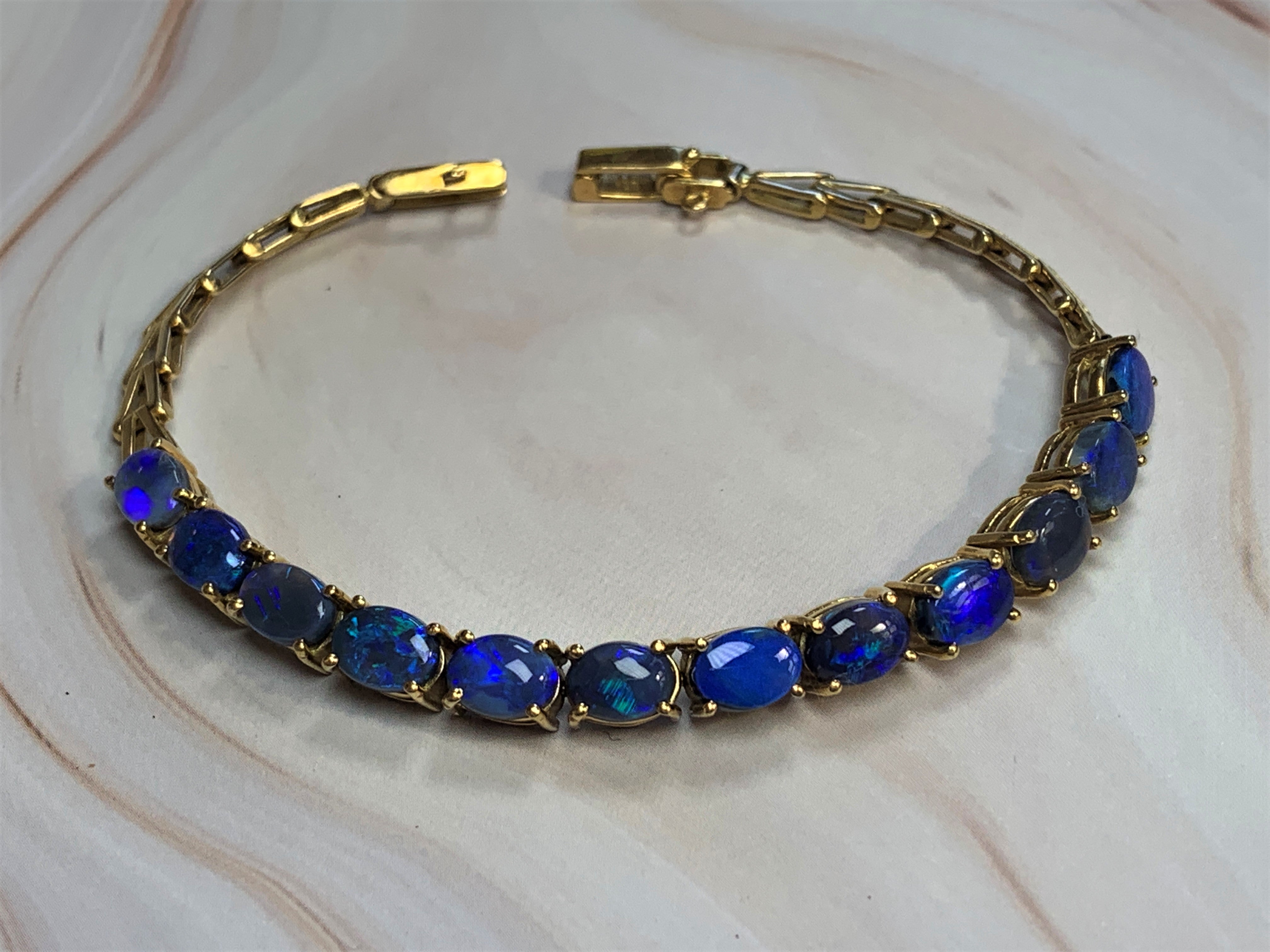 18kt Yellow Gold Black Opal 4.2ct bracelet - Masterpiece Jewellery Opal & Gems Sydney Australia | Online Shop