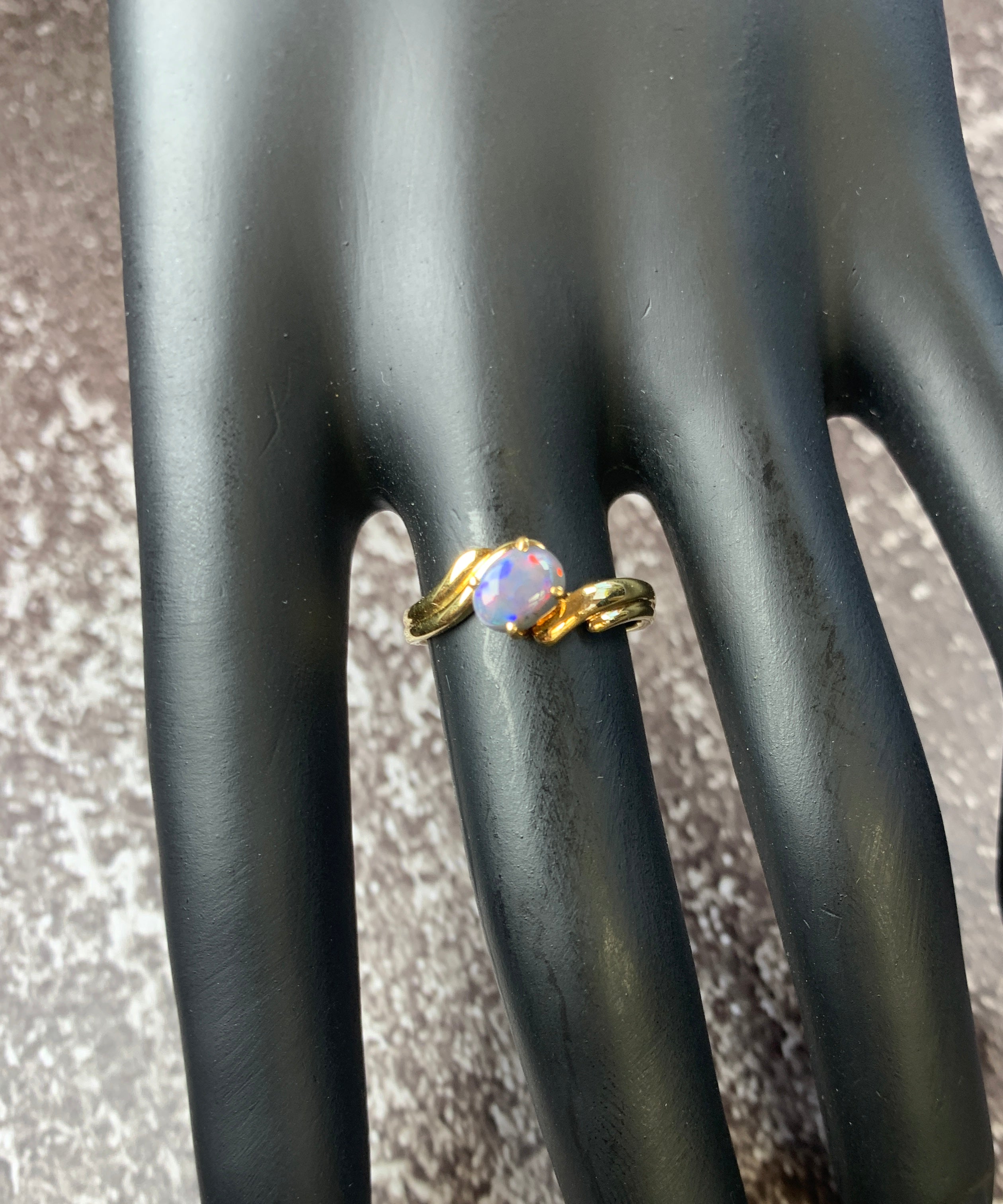 18kt Yellow Gold Black Opal 0.63ct cross over split shank ring - Masterpiece Jewellery Opal & Gems Sydney Australia | Online Shop