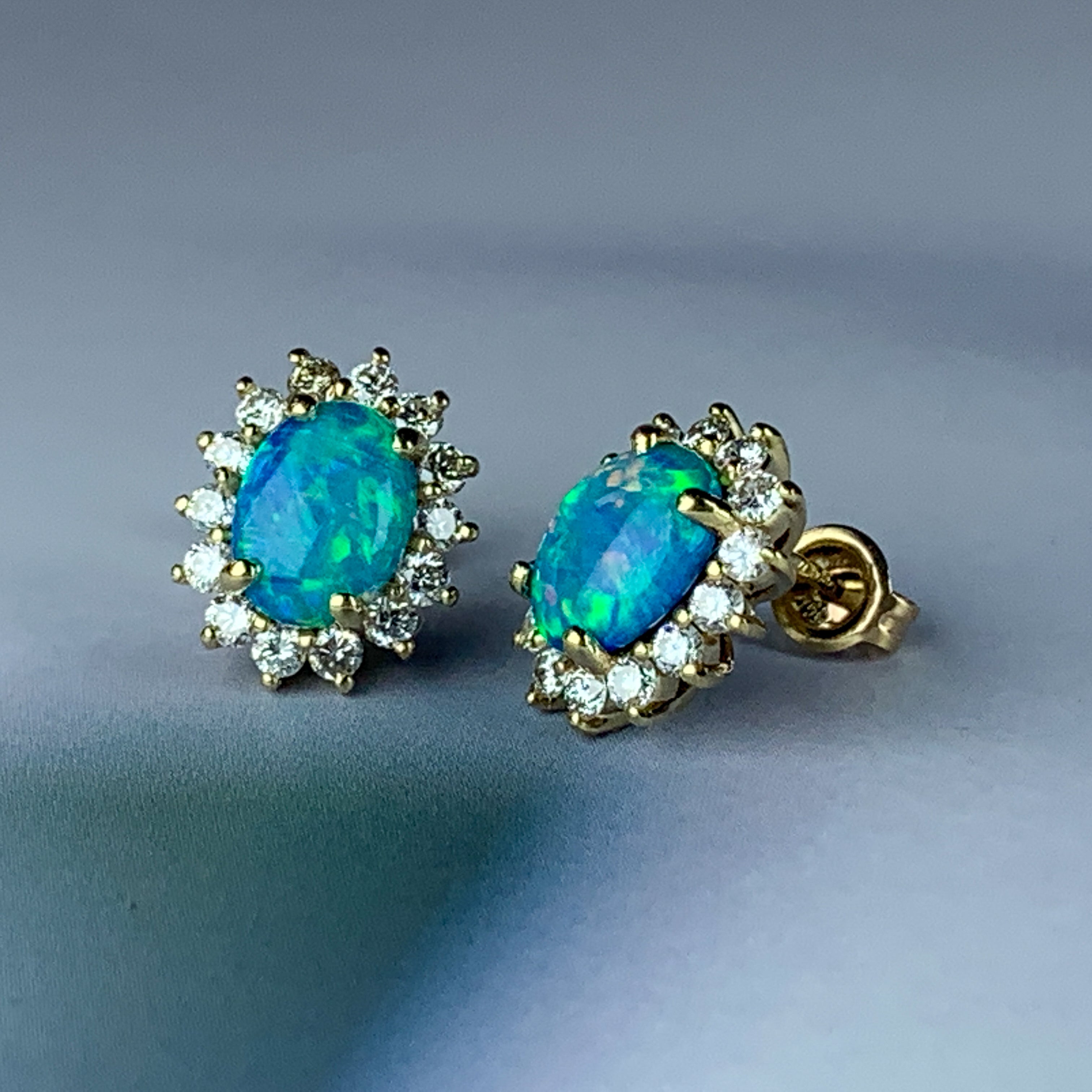 18kt Yellow Gold Crystal Opal 1.5ct and 28 Diamond 0.42ct halo