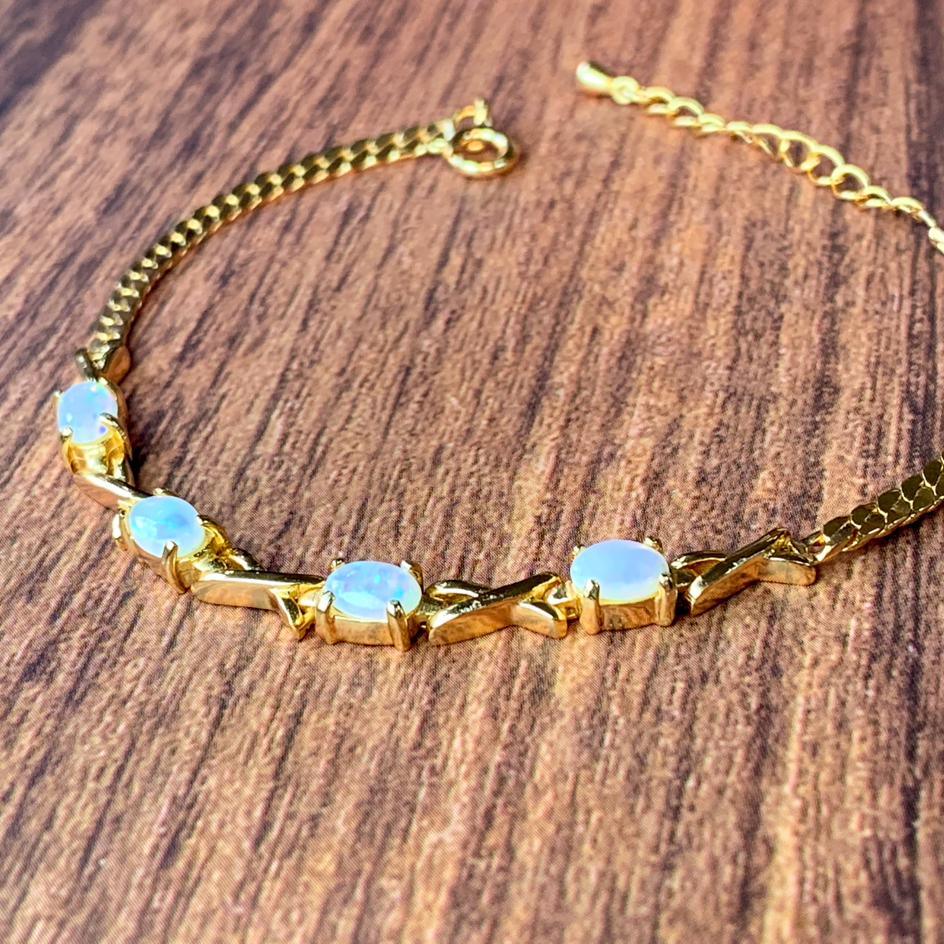 Gold plated silver 6x4mm White Opal bracelet cross design - Masterpiece Jewellery Opal & Gems Sydney Australia | Online Shop