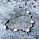 Sterling Silver wave 8x6mm Oval White Opal bracelet - Masterpiece Jewellery Opal & Gems Sydney Australia | Online Shop